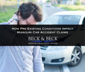 Man rubbing his neck after a car crash in Missouri illlustrating how pre-existing conditions impact car accident claims