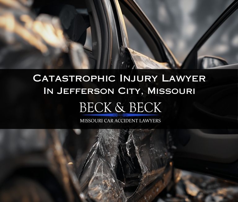 Black car with severe damage related to a catastrophic injury claim handled by Beck & Beck Missouri Car Accident Lawyers