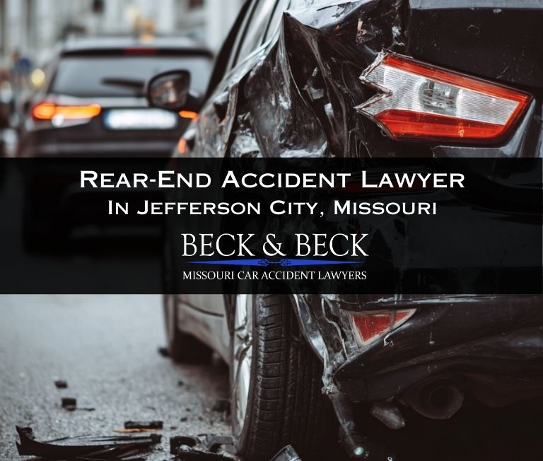 Close up of the smashed in rear bumper of a car related to a case handled in Jefferson City by Beck & Beck Missouri Car Accident Lawyers