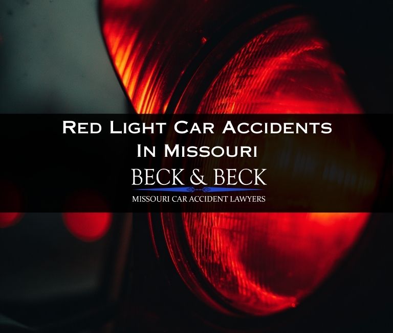 Close up of a red light viewed from the inside of a car just before an accident in Missouri