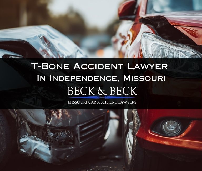 Extreme close up of two crashed cars after a broadside collision at a four way-intersection in Independence, Missouri