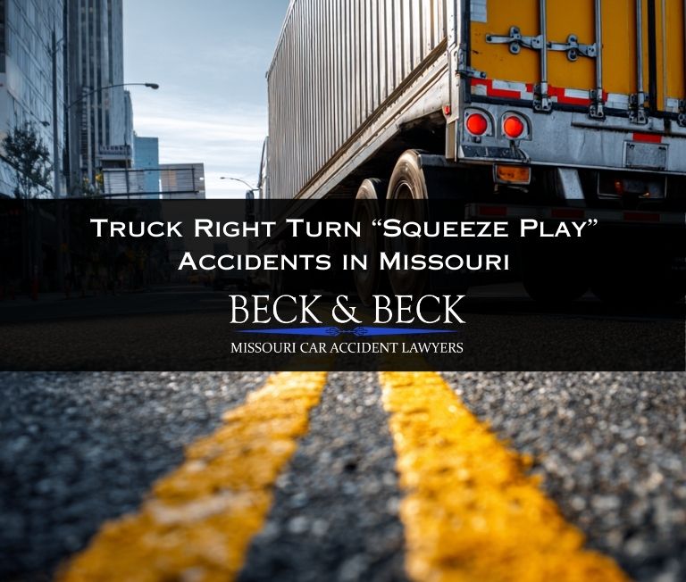 Close up of the back of a semi-truck making a sharp right turn at an intersection in Missouri