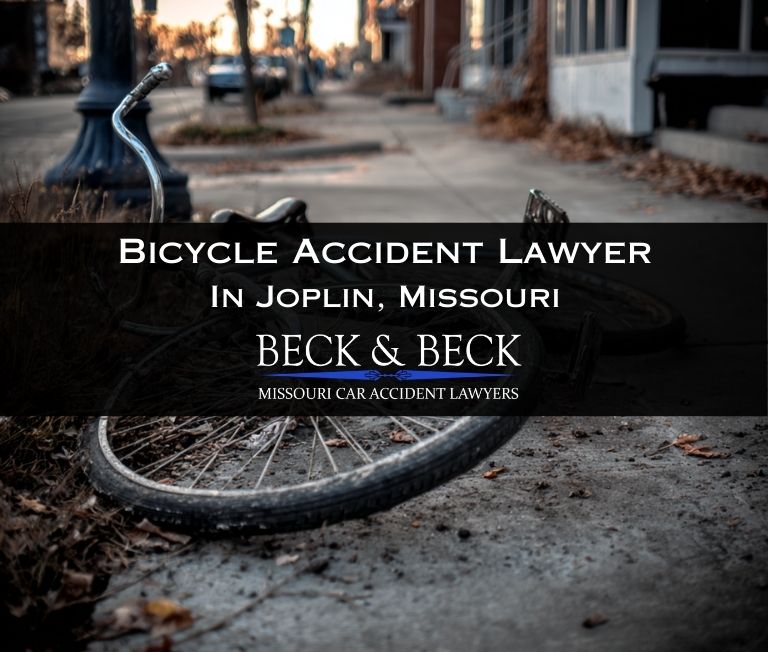 Damaged bicycle after an accident in downtown Joplin, Missouri related to a case handled by Beck & Beck Missouri Car Accident Lawyers
