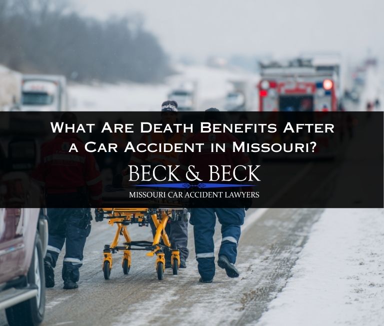 Car accident scene on a highway in Missouri illustrating death benefits after a fatal car accident