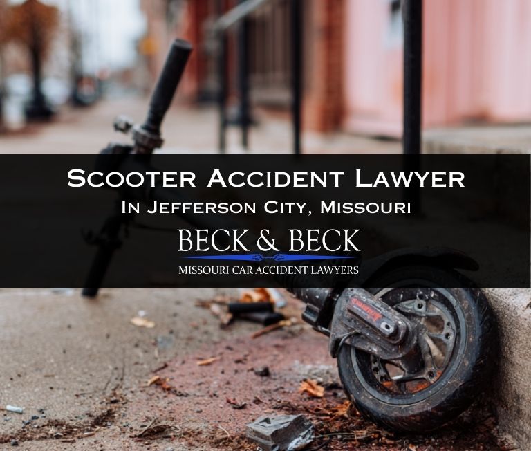 Crashed scooter on the sidewalk in downtown Jefferson City, Missouri related to a case handled by Beck & Beck Missouri Car Accident Lawyers