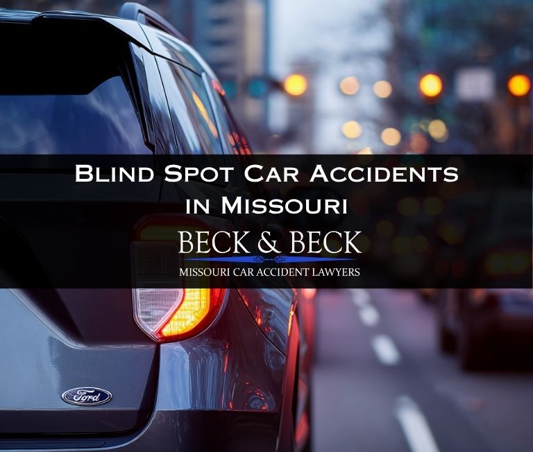 View from behind of an SUV with left turn signal on changing lanes in heavy traffic in St. Louis, Missouri