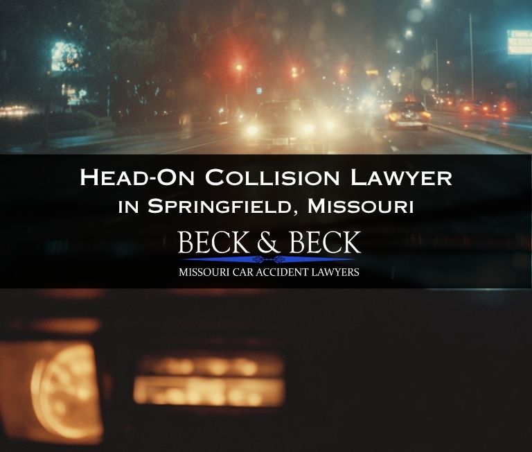 View from inside a car at night of bright headlights of another car directly in front of them in Springfield, Missouri