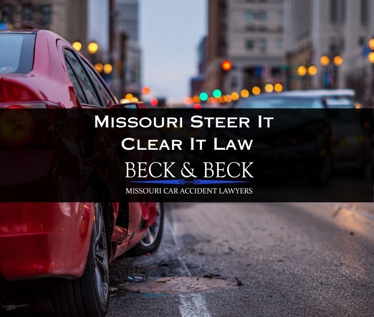 Car crashed in heavy traffic in downtown St. Louis, Missouri illustrating Missouri's steer it clear it law