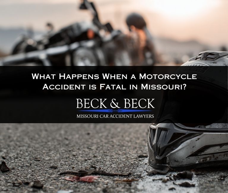 Crashed motorcycle on a highway in Missouri with a motorcycle helmet next to it on the ground