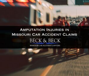 EMTs assisting a car accident victim with amputation injuries in St. Louis, Missouri