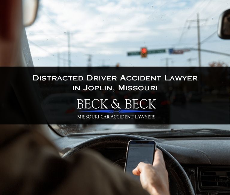 Driver texting while in heavy traffic in Joplin, Missouri