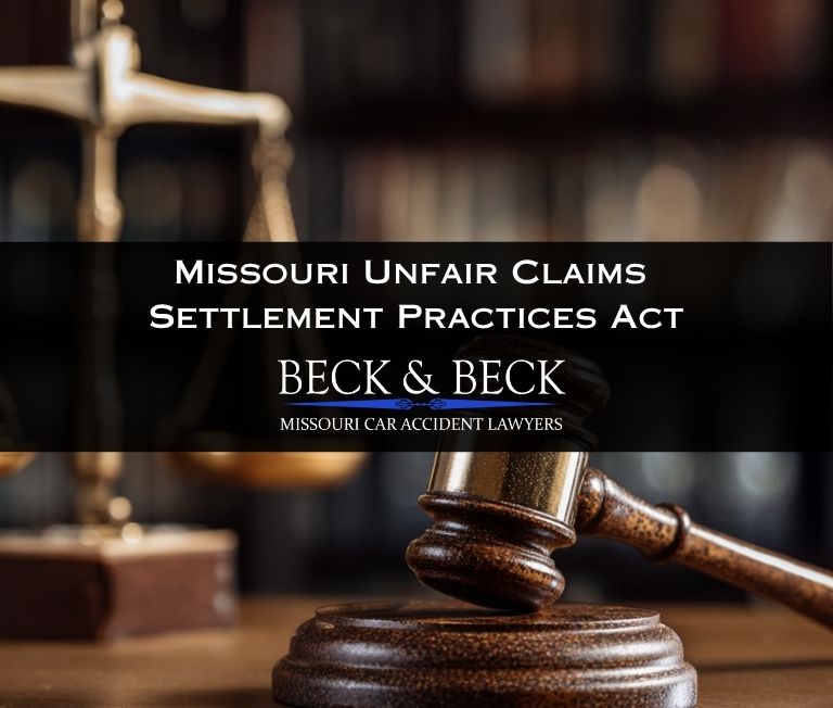 Judges gavel with personal injury scale behind it illustrating Missouri unfair claims settlement practices act