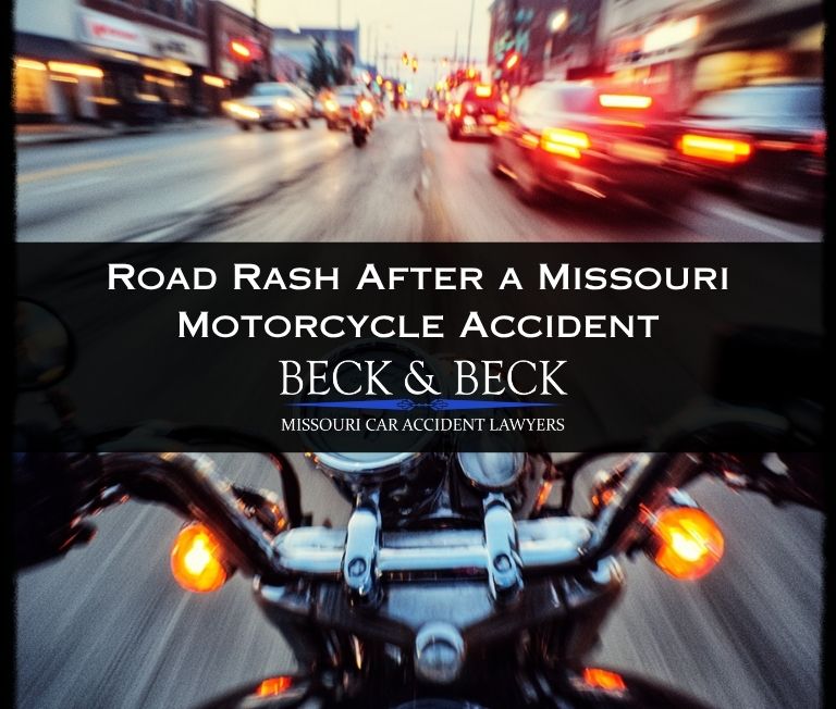 Motorcycle rider in heavy traffic in St. Louis, Missouri
