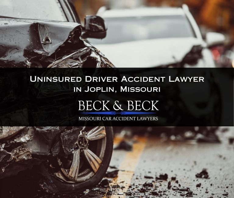 Car accident at an intersection caused by an uninsured driver in Joplin, Missouri