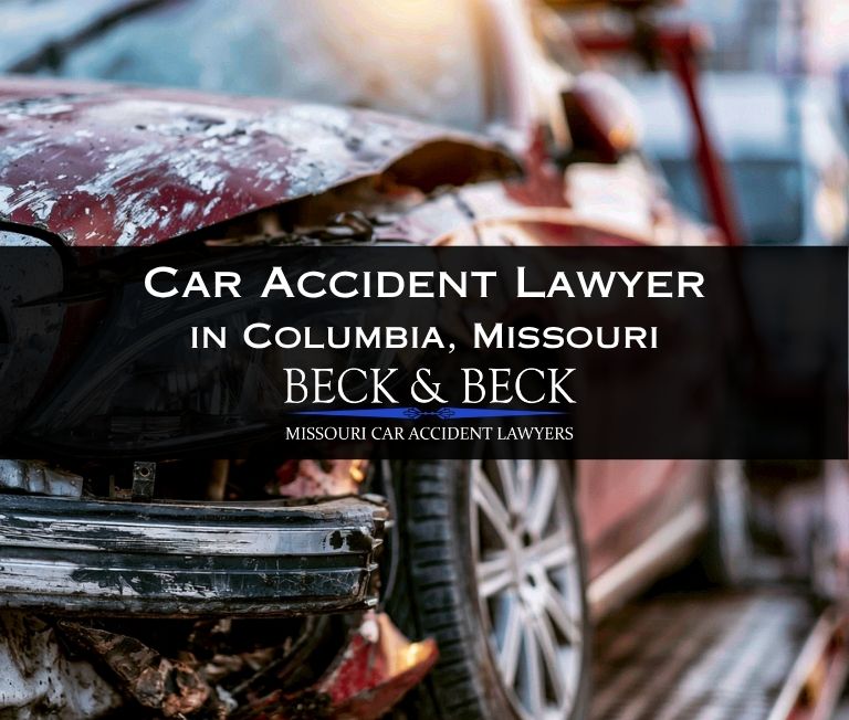 Badly damaged car on a tow truck after a crash in Columbia, Missouri