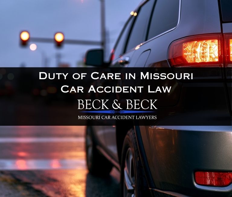 SUV waiting to turn left at a stop light illustrating duty of care in Missouri car accident law