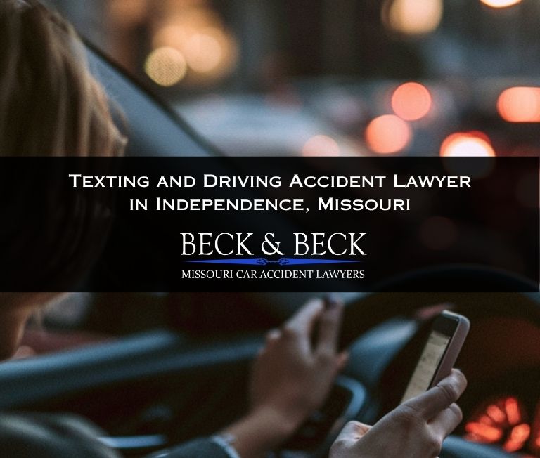 Driver on her phone texting and driving in downtown Independence, Missouri