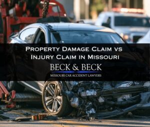 Crashed car being loaded onto a tow truck in St. Louis, Missouri