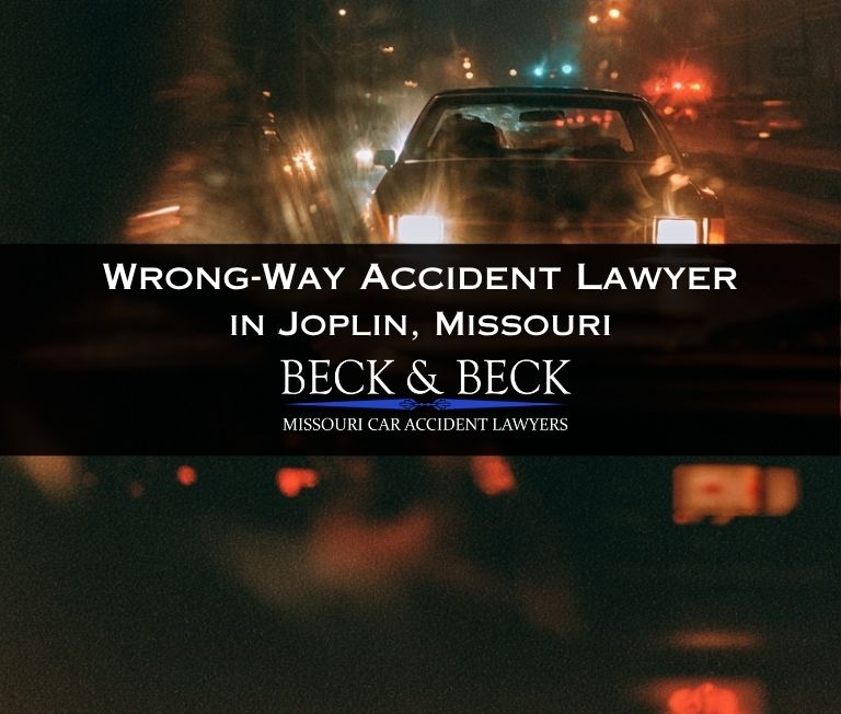 Driver going the wrong way down a one way street at night in Joplin, Missouri