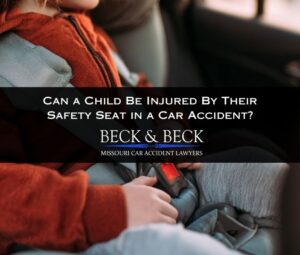 Child in a booster seat in a car in St. Louis, Missouri