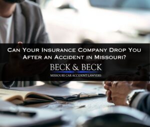 Man with his hands out confused speaking with a car insurance adjuster after an accident in an office in Missouri